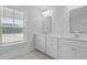 Bathroom featuring double vanity, large window, and tile flooring at 201 Terrace View Dr, Summerville, SC 29486