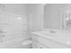 Bright bathroom featuring a tub-shower combo and white vanity at 201 Terrace View Dr, Summerville, SC 29486