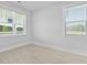 Bright bedroom featuring large windows and light-colored wood floors at 201 Terrace View Dr, Summerville, SC 29486