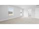Bright bedroom with soft carpeting, a window, and access to a private balcony at 201 Terrace View Dr, Summerville, SC 29486