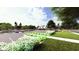 Picturesque community with lush landscaping, walking paths, and a glimpse of the community pool and amenities at 201 Terrace View Dr, Summerville, SC 29486