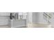 Stylish kitchen and staircase featuring an island, stainless steel fridge, and white cabinets at 201 Terrace View Dr, Summerville, SC 29486