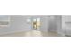 Bright living space featuring wood floors, large sliding doors, and a connection to the kitchen at 201 Terrace View Dr, Summerville, SC 29486