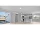 Open-concept living space showcasing a modern kitchen, sliding door, and access to the garage at 201 Terrace View Dr, Summerville, SC 29486