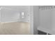 Entryway area includes a closet and a view into an adjacent room with light-colored wood flooring at 201 Terrace View Dr, Summerville, SC 29486