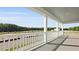 Wide porch with white railings offering scenic views at 201 Terrace View Dr, Summerville, SC 29486