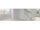 Bright interior with a staircase, white trim, neutral walls, and a view to the exterior at 201 Terrace View Dr, Summerville, SC 29486