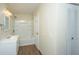 Bathroom featuring a tub-shower combo, vanity, closet, and access to other rooms at 2011 N Highway 17 # 1400B, Mount Pleasant, SC 29466