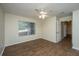 Bedroom featuring modern flooring, a ceiling fan and access to other rooms at 2011 N Highway 17 # 1400B, Mount Pleasant, SC 29466
