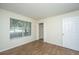 Bedroom featuring modern flooring, a window, closet and access to other rooms at 2011 N Highway 17 # 1400B, Mount Pleasant, SC 29466