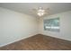 Bedroom featuring modern flooring, a ceiling fan and a window offering natural light at 2011 N Highway 17 # 1400B, Mount Pleasant, SC 29466