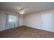 Living room with wood-look floors, neutral walls, and a ceiling fan at 2011 N Highway 17 # 1400B, Mount Pleasant, SC 29466