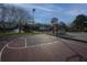 Recreational area showcasing playground, a basketball court, and scenic pond view for community enjoyment at 2011 N Highway 17 # 1400B, Mount Pleasant, SC 29466