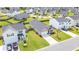 Aerial view of a residential neighborhood with well-maintained homes and green lawns at 215 Cypress Plantation Rd, Moncks Corner, SC 29461