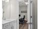 Bathroom features a sleek vanity with a modern sink, and an open doorway leads to a separate room at 215 Cypress Plantation Rd, Moncks Corner, SC 29461