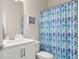 Bathroom features stylish decor, modern vanity, sink and toilet with a view into another room at 215 Cypress Plantation Rd, Moncks Corner, SC 29461