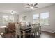Inviting dining area with a wooden table, visible from the adjacent living room space at 215 Cypress Plantation Rd, Moncks Corner, SC 29461