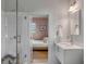 Bathroom vanity and doorway to a bedroom with white and pink decor at 222 Haddrell St, Mount Pleasant, SC 29464