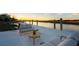 Outdoor seating offers the best views from this home's private dock at sunset at 222 Haddrell St, Mount Pleasant, SC 29464