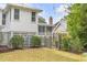 Exterior of home with white siding and brick walkway at 222 Haddrell St, Mount Pleasant, SC 29464