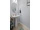 Bright half bathroom features pedestal sink, and decor at 234 Cameron St, Summerville, SC 29486