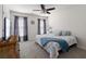 Bright bedroom showcases a decorative dresser, plush bed, and modern ceiling fan at 234 Cameron St, Summerville, SC 29486
