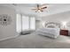 Spacious bedroom with plush carpeting, ceiling fan and ample natural light at 234 Cameron St, Summerville, SC 29486