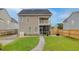 Charming two-story home with a backyard, screened-in patio, and a well-manicured lawn at 234 Cameron St, Summerville, SC 29486