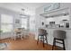 Bright eat-in kitchen with white cabinets, modern appliances and granite countertops at 234 Cameron St, Summerville, SC 29486