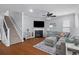 Relaxing living room showcasing a fireplace, plush sectional sofa, and stylish decor at 234 Cameron St, Summerville, SC 29486