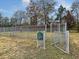 Dog park with fencing, benches, and a secure entrance for a safe and enjoyable experience for pets and their owners at 252 Island Green Rd, Goose Creek, SC 29445
