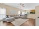 Cozy living room featuring hardwood floors and a comfortable sectional sofa, open to the kitchen at 252 Island Green Rd, Goose Creek, SC 29445