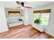 Cozy bedroom with bunk beds, storage dresser, hardwood floors and natural lighting at 27 Fitzroy Dr, Charleston, SC 29414