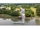 Waterfront homes boast private dock, lush landscaping, and serene river views at 2962 Anchor Watch Dr, Wadmalaw Island, SC 29487