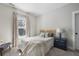 Cozy bedroom featuring natural light, stylish décor, and comfortable furnishings at 2962 Anchor Watch Dr, Wadmalaw Island, SC 29487