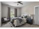 Well-appointed bedroom showcases elegant décor, plush bedding, and ample natural light at 2962 Anchor Watch Dr, Wadmalaw Island, SC 29487