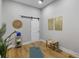 Bright workout room with a wooden floor, sliding barn door, and minimalist decor at 2962 Anchor Watch Dr, Wadmalaw Island, SC 29487