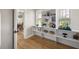 Pantry with custom shelving is perfect for storage and organization and has easy access to the dining room at 2962 Anchor Watch Dr, Wadmalaw Island, SC 29487