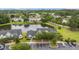Beautiful aerial shot showcasing a community pond, lush landscaping, and convenient parking at 402 Pine Bluff Dr, Summerville, SC 29483