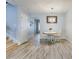 Inviting dining area featuring wood floors, chandelier, and easy access to other living spaces at 402 Pine Bluff Dr, Summerville, SC 29483