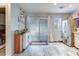 Bright kitchen with stainless steel appliances, ample cabinet space, and sliding glass doors at 402 Pine Bluff Dr, Summerville, SC 29483