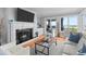 Stylish living room features a fireplace and ocean views at 4303 Sea Forest Dr, Kiawah Island, SC 29455