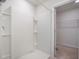 Bright shower with white walls and shelving, accessible from Primary bathroom at 452 Minim St, Charleston, SC 29414