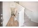 Welcoming hallway with neutral walls, and a staircase leading to the upper level at 452 Minim St, Charleston, SC 29414
