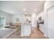 Modern kitchen with granite countertops, stainless steel appliances, and an open view to living area at 452 Minim St, Charleston, SC 29414