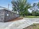 Brick home with a concrete driveway and well-maintained landscaping around the perimeter at 4649 N U.S. Highway 52, Saint Stephen, SC 29479