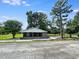 Charming brick home featuring a large front yard and concrete driveway at 4649 N U.S. Highway 52, Saint Stephen, SC 29479