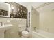 Bathroom with a vanity, toilet, and a shower-tub combination at 4735 W Park Pl, North Charleston, SC 29405