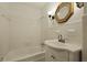 Cozy bathroom featuring a vanity and tub with a classic design at 4735 W Park Pl, North Charleston, SC 29405