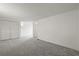 Bedroom featuring neutral walls, plush carpet, a closet, and an open doorway at 4735 W Park Pl, North Charleston, SC 29405